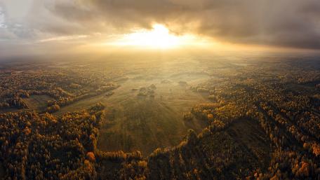 Golden Sunset Over Tranquil Autumn Fields wallpaper