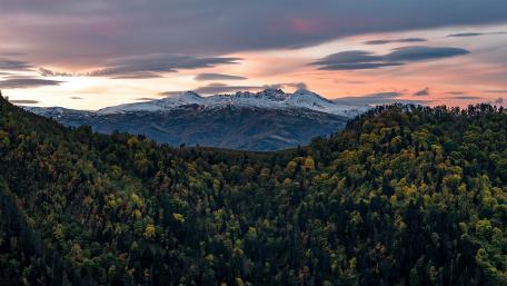Majestic Mountains Under a Colorful Sky wallpaper