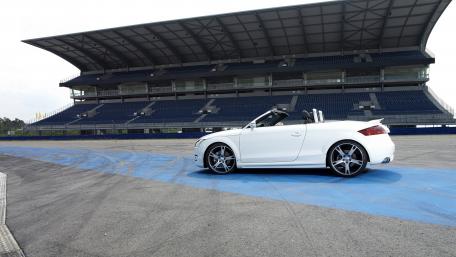 Sleek Convertible at the Race Track wallpaper