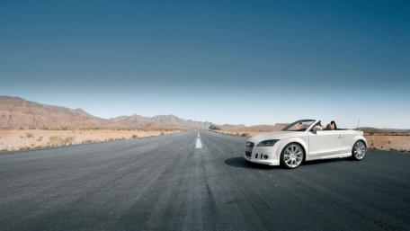 Sleek Convertible on an Open Road wallpaper