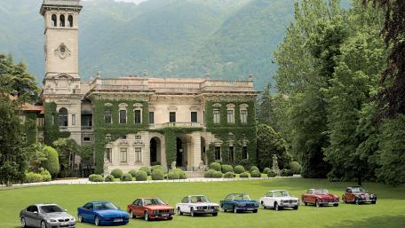 Classic Cars in a Historic Setting wallpaper