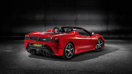Sleek Red Convertible Under Industrial Lighting wallpaper