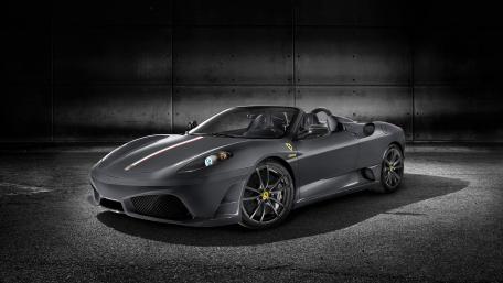 Sleek Black Sports Car Wallpaper wallpaper