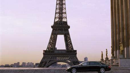 Elegant Car near Eiffel Tower at Dusk wallpaper