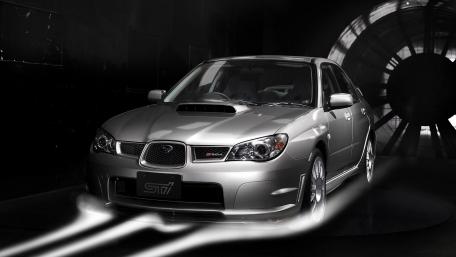 Sleek Silver Subaru STI in Motion wallpaper