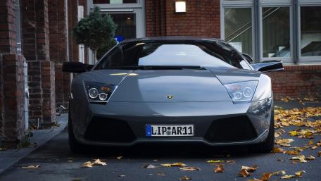 Sleek and Powerful Grey Sports Car Wallpaper wallpaper