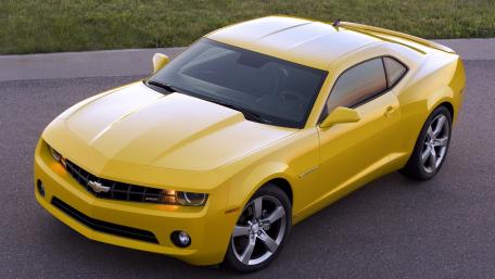 Vibrant Yellow Camaro Captured in High Detail wallpaper