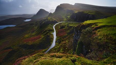 Majestic Road Through Idyllic Highlands wallpaper