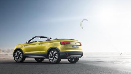 Vibrant Convertible Car by the Beach wallpaper