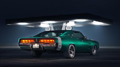 Striking Green Muscle Car at Night wallpaper