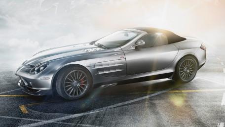 Sleek Silver Cabriolet in Dreamlike Setting wallpaper