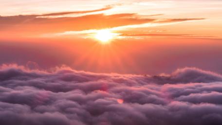 Serene Sunrise Above the Clouds wallpaper