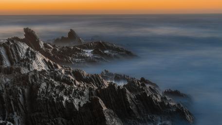 Majestic Foggy Ridge at Dawn wallpaper