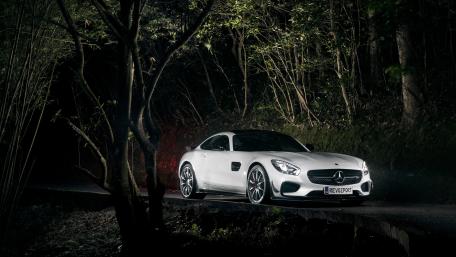 Sleek Mercedes in a Nighttime Paradise wallpaper