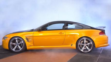 Vibrant Yellow Sports Car Wallpaper wallpaper