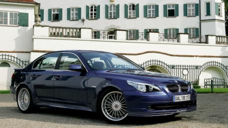 Elegant BMW Sedan in a Historic Setting wallpaper