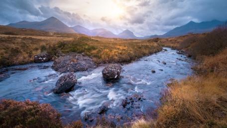 Serene Mountain River Scene in Nature wallpaper