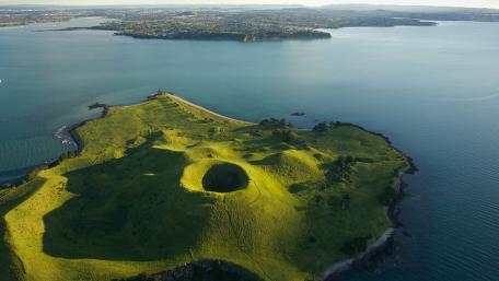 Breathtaking Aerial View of Vibrant Green Island Landscape wallpaper