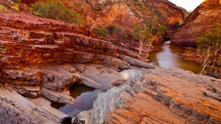 Majestic Red Rock Landscape by the Waterfall wallpaper
