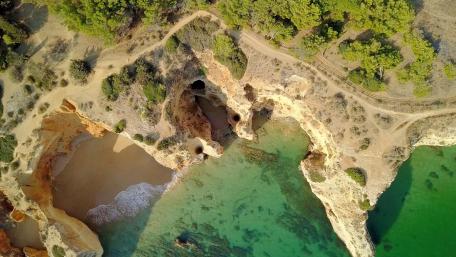 Scenic Aerial View of Coastal Beach and Cliffs wallpaper