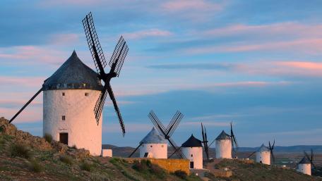 Windmills Under a Colorful Sky wallpaper