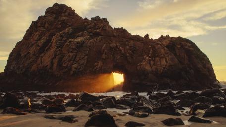 Majestic Rock Formation by the Sea wallpaper
