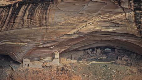 Majestic Canyon Shelters Surrounded by Nature wallpaper
