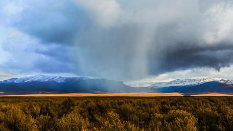 Majestic Mountain Rainfall Scene wallpaper