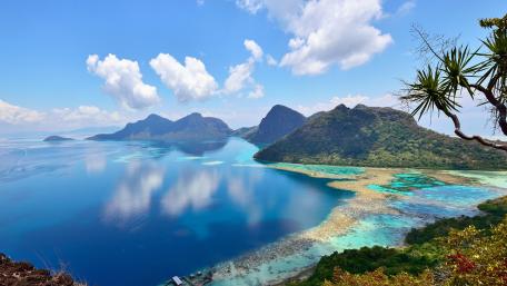 Serenity of Tropical Islands Over Crystal Blue Waters wallpaper