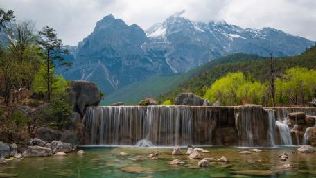 Serene Mountain Cascade Scene wallpaper