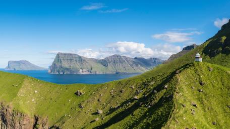 Majestic Coastal Landscape Under a Clear Blue Sky wallpaper
