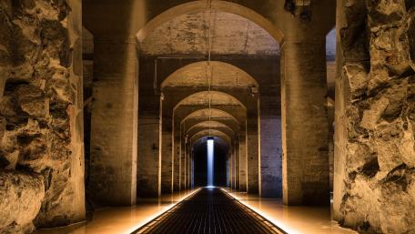 Mystical Light in an Ancient Hallway wallpaper