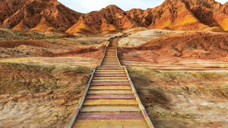 Stairway Through Vibrant Hills wallpaper