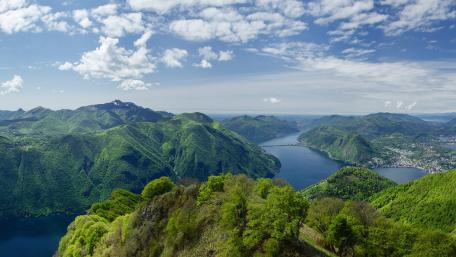 Breathtaking Mountain View Over Lush Green Valley wallpaper