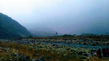 Serene River in Misty Mountains wallpaper