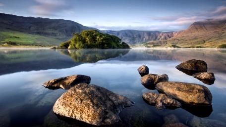 Serene Lake Reflection in Nature's Embrace wallpaper