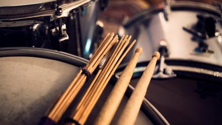 Rhythmic Harmony of Drums and Sticks wallpaper