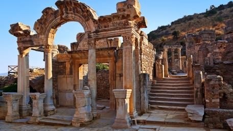 Ancient Ruins in a Modern City Landscape wallpaper