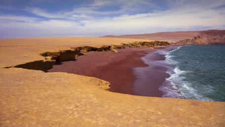 Crimson Shoreline of the Desert Coastline wallpaper