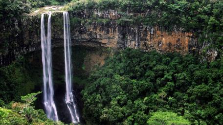 Majestic Twin Waterfalls Amidst Lush Greenery wallpaper