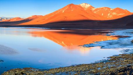 Majestic Mountain Reflections by a Tranquil Lake wallpaper