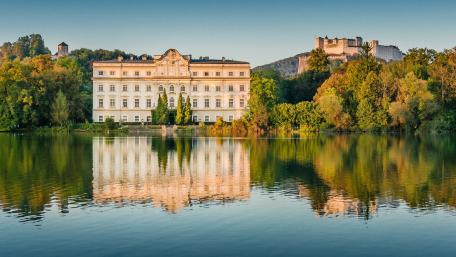Majestic Reflections of an Enchanted City Landscape wallpaper