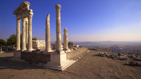 Ancient Ruins Overlooking a Scenic Landscape wallpaper