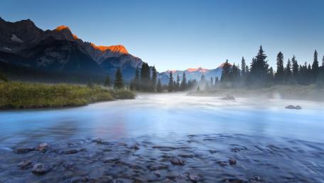 Serene Mountain River at Dawn wallpaper