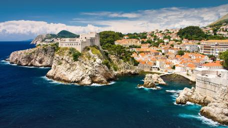 Stunning Coastal Cityscape Overlooking the Sea wallpaper