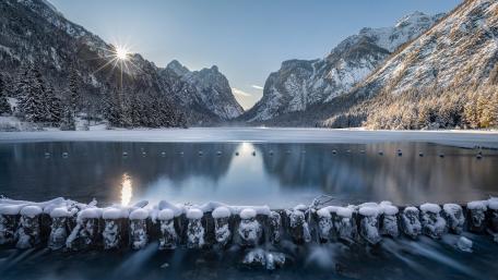 Majestic Winter Wonderland Beyond the Mountains wallpaper