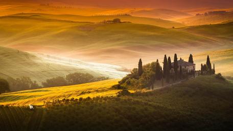 Golden Hills and Serene House at Sunset wallpaper