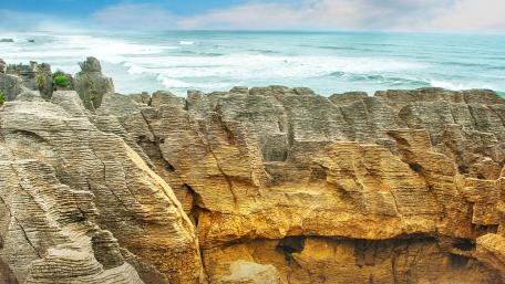 Majestic Coastal Cliffs Overlooking the Ocean Waves wallpaper
