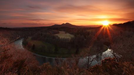 Serene Sunset Over Lush Valley Landscape wallpaper