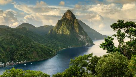 Majestic Peaks and Tranquil Waters in Nature's Embrace wallpaper